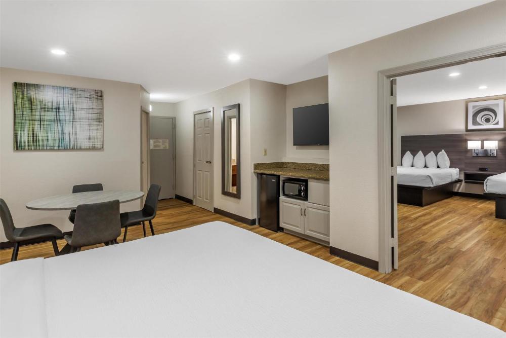 One-Bedroom Family Suite with One King and Two Queen Beds with Sofa Bed - Non-Smoking interior